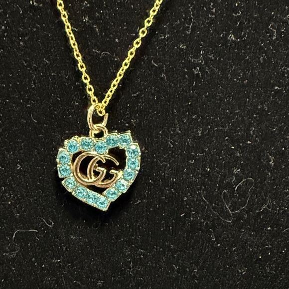 GUCCI Turquoise & Gold Charm on Gold Tone Necklace - Picture 3 of 11